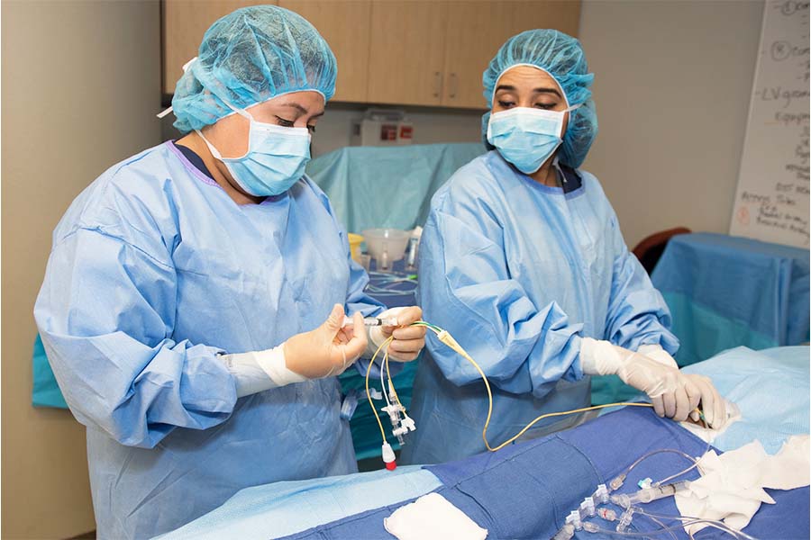 Technician with syringe in a clinic