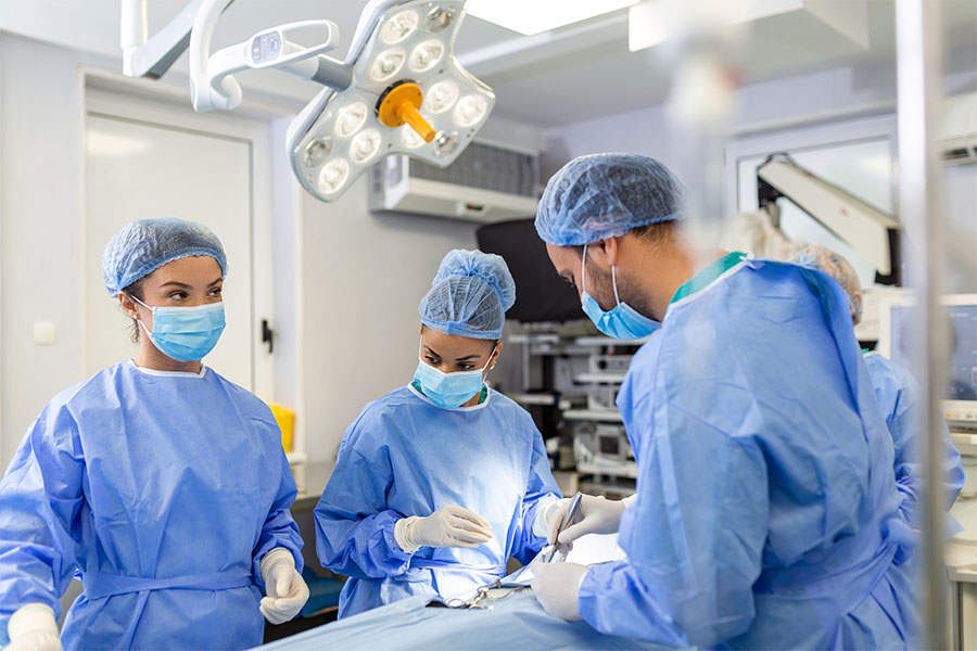Surgeons in operating room.