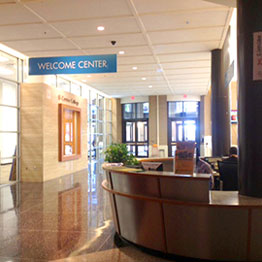 View of the El Centro Welcome Center desk in the entry hallway
