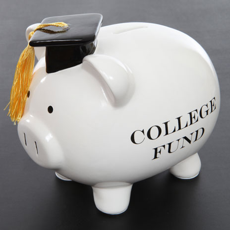 White piggy bank labeled 'COLLEGE FUND' wearing a black graduation cap