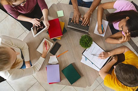 Group of students doing homework