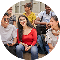 Group of students sitting on stairs