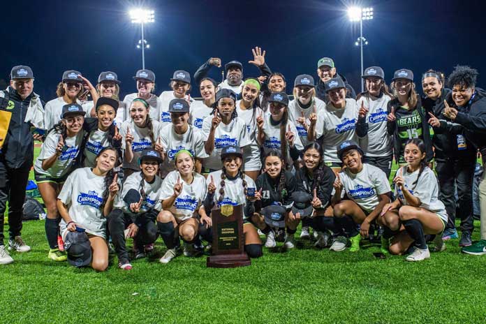 The Brookhaven 2023 women's soccer team poses with their national championship trophy