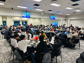 Students eat a meal at the MAP Summit